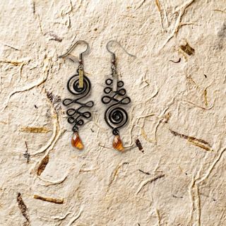 Spirale d’Ambre — boucles d’oreilles fait main à Clermont-Ferrand